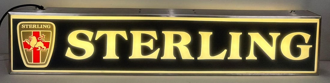 Sterling w/Logo (truck?) Plastic Lighted Sign: rated 9, 12"x60"x6", the 2-molded plastic inserts are in good condition, lights up nicely. 