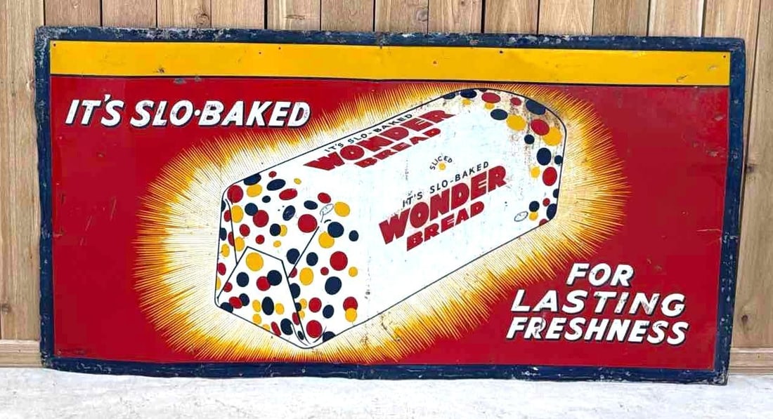 Wonder Bread Metal Sign (TAC): rated 6.5, 37"x73", the SST embossed sign has heavy wear, scratches and ceases. TAC #063724