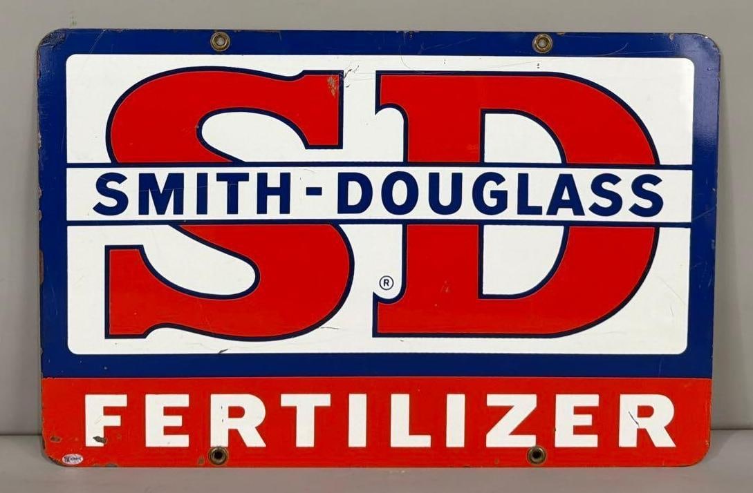 Smith-Douglass Fertilizer Metal Sign (TAC): rated 8.5, 15.75"x24", the DST sign has good color and shine, has light wear and fine scratches in the fields. Rarity 3. TAC #036915