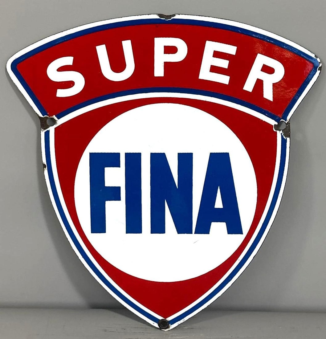 Super Fina Porcelain Pump Sign (TAC): rated 8.9, 11"x10.5", the SSP die-cut sign has excellent color and gloss. Field is clean with chips around the perimeter. Marked "P & M". Rarity 4. TAC #061376