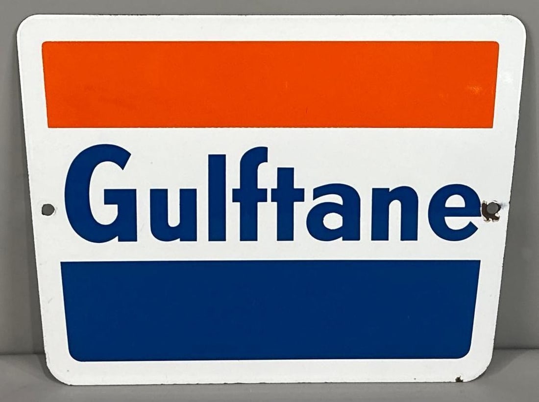 Gulftane Porcelain Pump Plate Sign: (Rated 9.0). 9" x 11". This SSP sign has great color and gloss with notable porcelain loss on the hanging holes and outer edge. Rarity 1. TAC # 062199