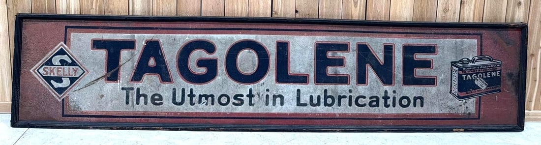 Skelly Tagolene "The Utmost in Lubrication" Smaltz Metal Sign w/Can (TAC): 25.5"x 119.5", the SST Smaltz wood framed sign shows some wear from age and use, has nice early can logo, first we have had the oppertunity to sell, cool early sign, Rarity 8. TAC #063762