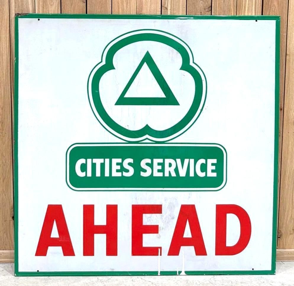 Large Cities Service Ahead Metal Sign (TAC): rated 8, 58.5"x58.5", the SST rolled edge wood backed sign, the white is reflective and is slightly soiled, has paint drips. Rarity 6. TAC #063822