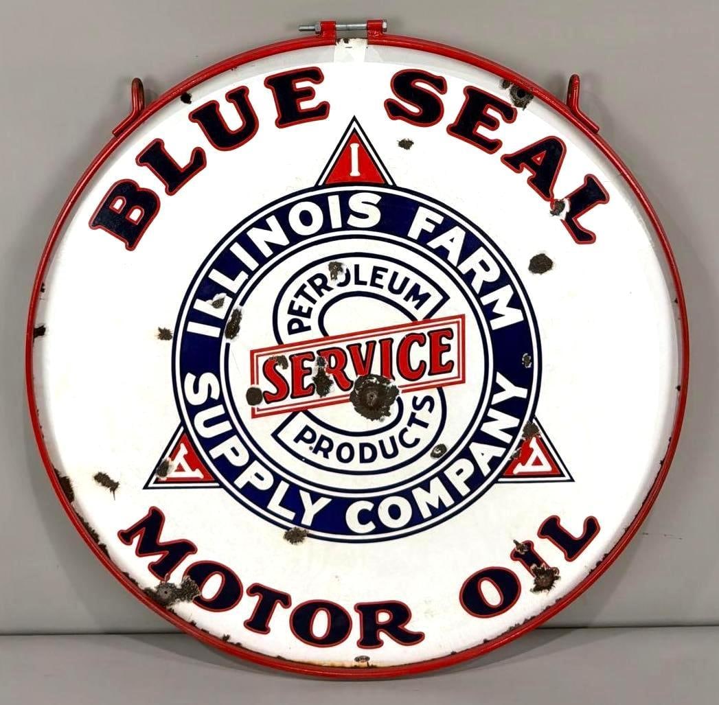 Illinois Farm Supply Co. Blue Seal Motor Oil Porcelain Sign (TAC): rated 7.5, 30"D., the DSP sign has good color and some gloss, has chips and a few extra holes in the field. Rarity 6. TAC #036907