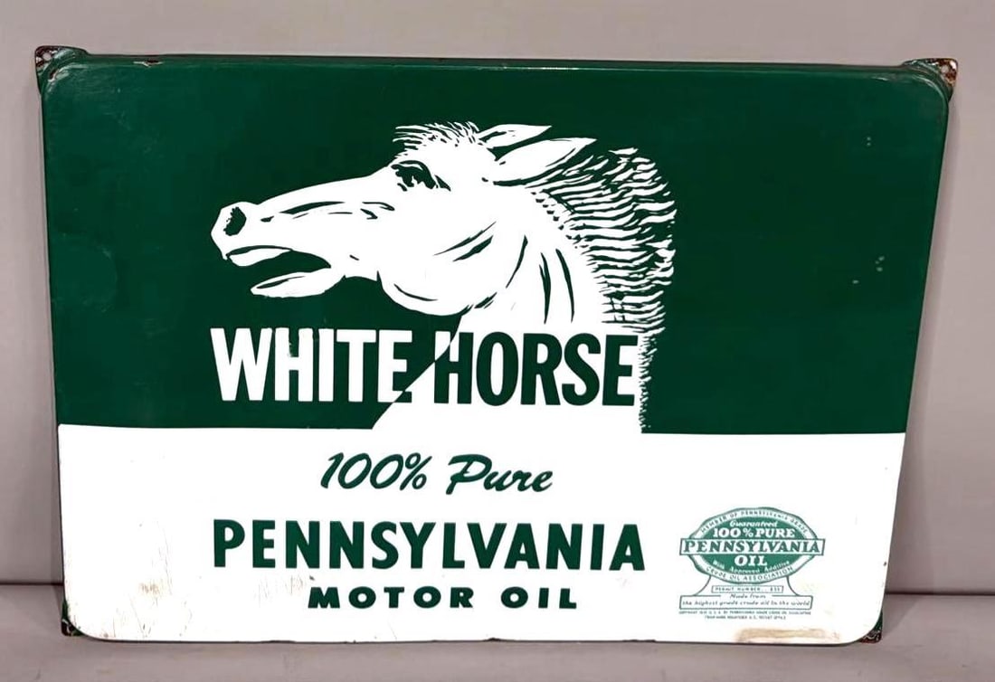 White Horse 100% Pennsylvania Motor Oil w/Image Porcelain Sign (TAC): rated 8, 18.5"x25", the SSP rolled edge sign has good color and gloss, has half-dollar size touch up chip in the field, under the chin, fine scratches in the lower field. Rarity 4. TAC #063780