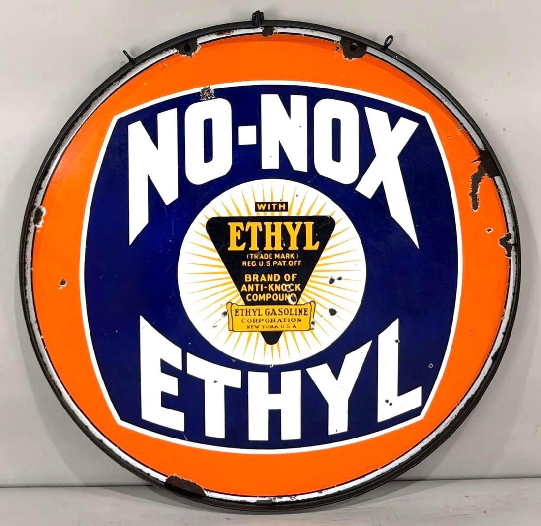 No-Nox Ethyl w/Logo Porcelain Sign (TAC): rated 7.75, 30"D., the DSP sign has good color and gloss, has chips and wear on both sides, has larger chips around the perimeter. Rarity 5. TAC #063836