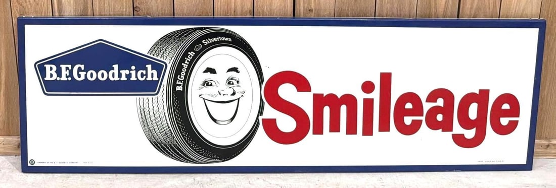 B.F. Goodrich Smileage w/Logo Metal Sign (TAC): rated 8.9, 22"x72", the SST rolled edge sign has small stain in the field, marked A-M, dated 1960. Rarity 4. TAC #063764