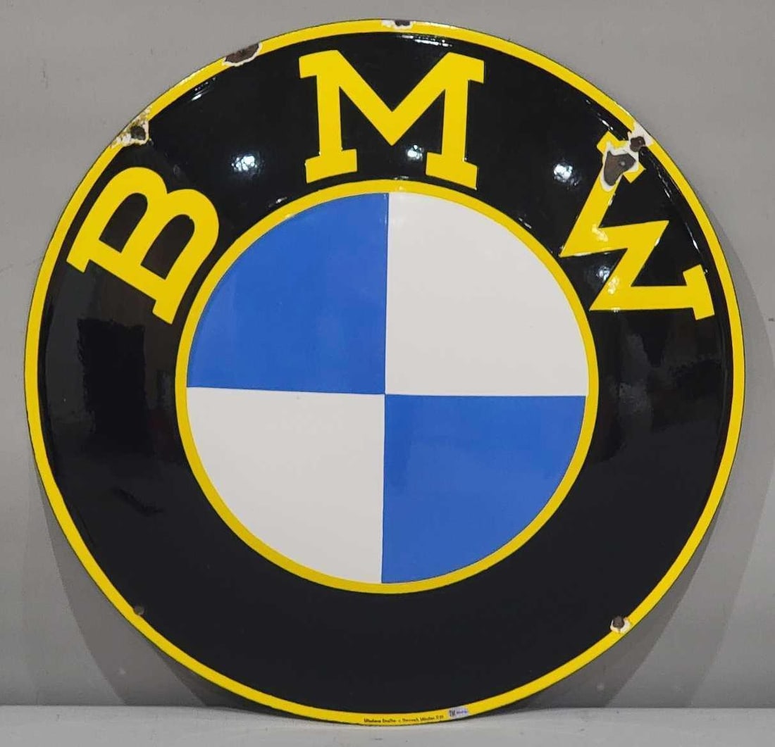 BMW (pre 1950) Porcelain Sign (TAC): rated 9, 23.25"D., the SSP domed sign has excellent color and gloss, field is clean, has chips at top point and at the mounting holes, marked Munchaner Emaillier. Rarity 5. TAC #032439