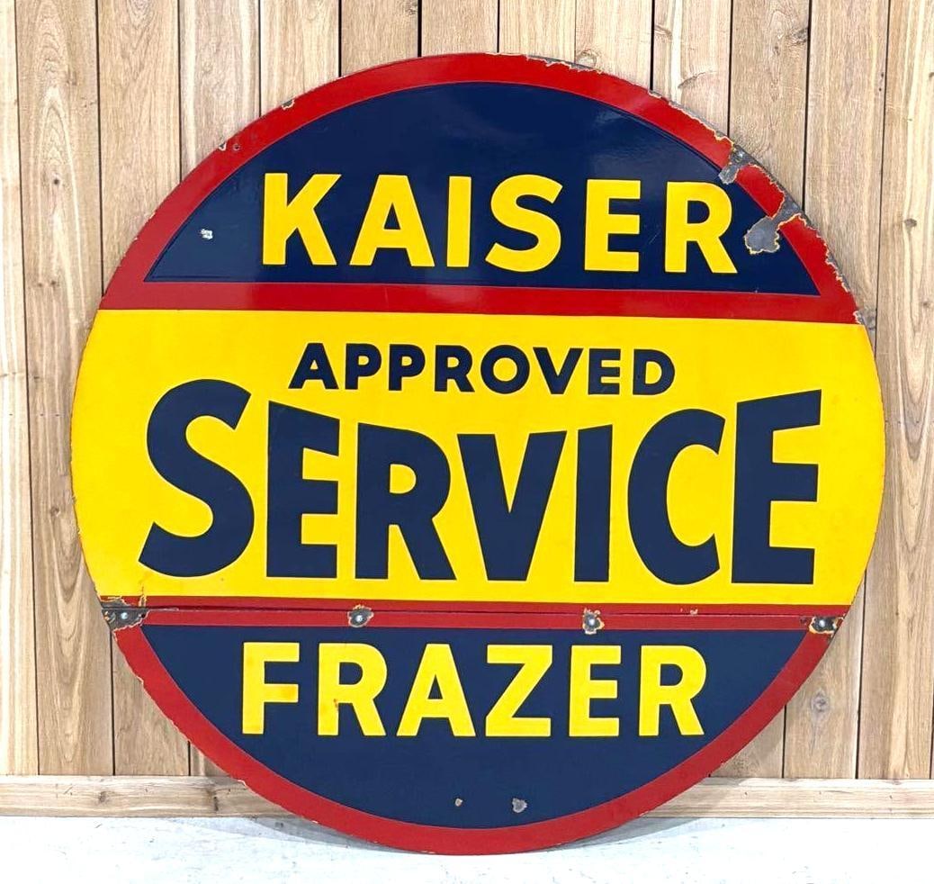 Kaiser Frazer Approved Service Porcelain Sign (TAC): rated 8, 58"D., the DSP sign has good color and gloss, has chips in the field and around the perimeter, large chip at 10 o'clock. Rarity 4. TAC #063857