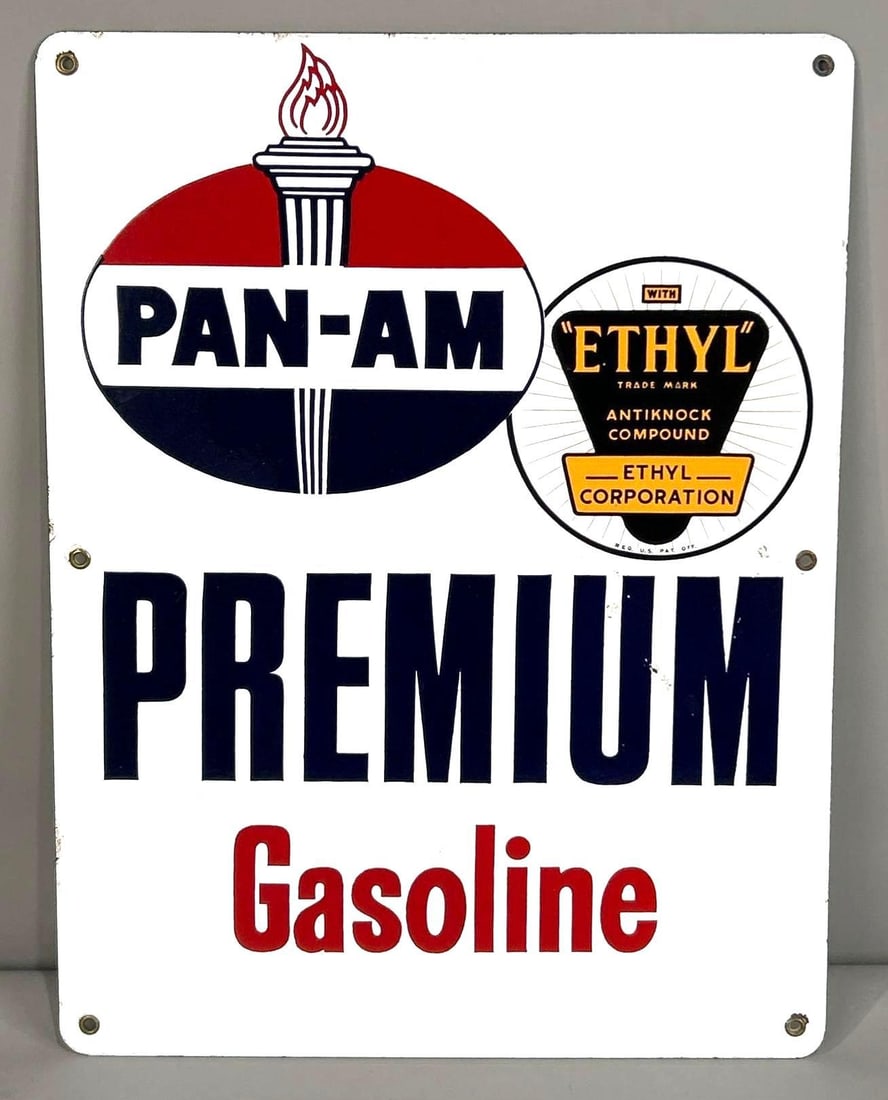 Pan-Am Premium Gasoline Porcelain Pump Plate Sign W/ Ethyl Logo: (Rated 8.9). 13" x 17.25". This SSP pump plate has good color and gloss throughout. Display has one minor porcelain chip on the "U" in Premium. Outer edge shows minimal wear. Rarity 2. TAC # 062272
