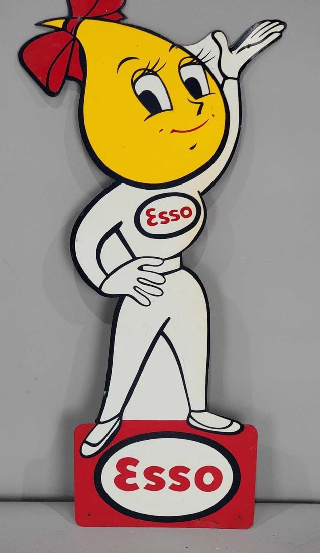 Esso Oil Drop Girl Metal Tacker Sign (TAC): rated 8.75, 15.75"x7", the SST die-cut sign has good color and shine, has light wear. Rarity 1. TAC #063265
