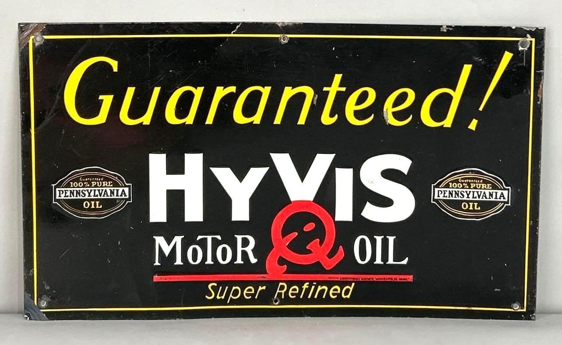 Hyvis Motor Oil Embossed Tin Sign: Rated 8.25. 8" x 14". This SST has good color and shine throughout. Sign has significant surface scratching in the field, as well as, paint loss on the outer edges. Marked, "Stout Advertising Agency".