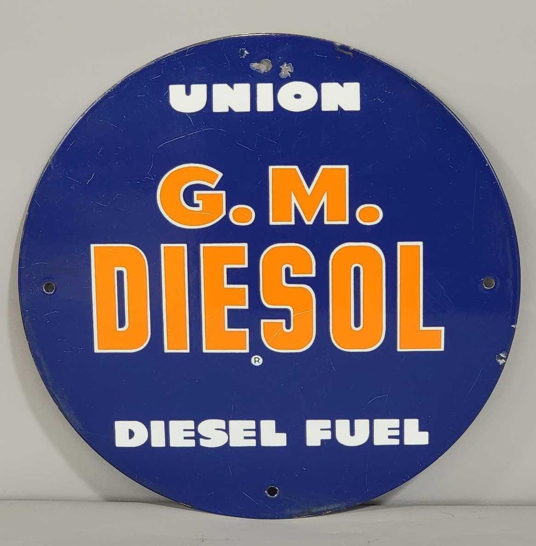 Union G.M. Diesol Diesel Fuel Porcelain Pump Sign (TAC): rated 8.75, 11.5"D. This SSP sign has good color and gloss with light wear and a few fine scratches. Rarity 5. TAC #061667