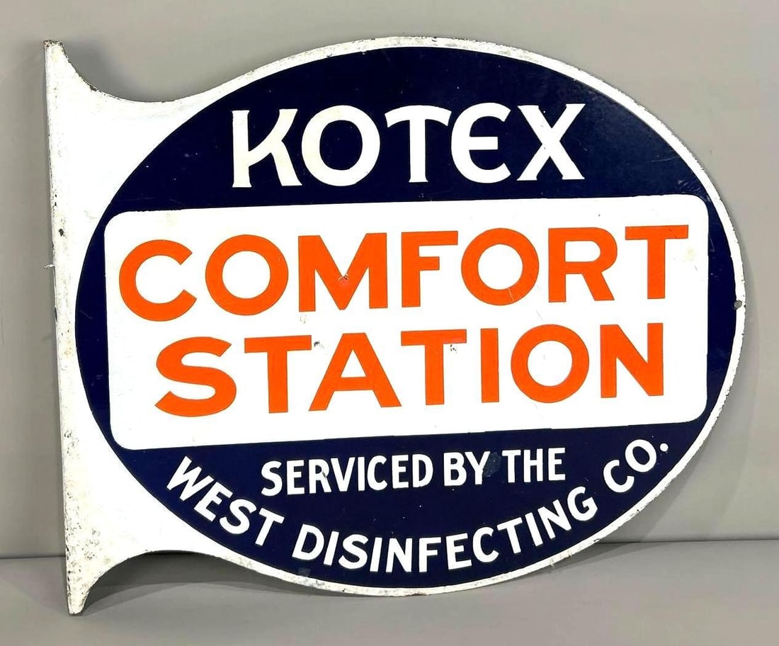 Kotex Comfort Station Porcelain Flange Sign (TAC): rated 7.75, 19"x23", the die-cut porcelain flange sign has good color and some gloss, has touched up chips and wear. Rarity 4. TAC #062837