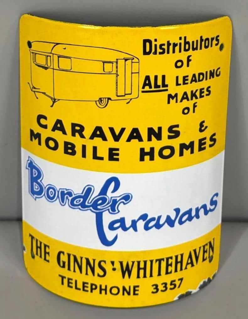 Border Caravans w/Image Porcelain Sign (TAC): rated 9, 12"x8.75", the SSP curved sign has excellent color and gloss, field is clean, has small chips around the perimeter. TAC #063651