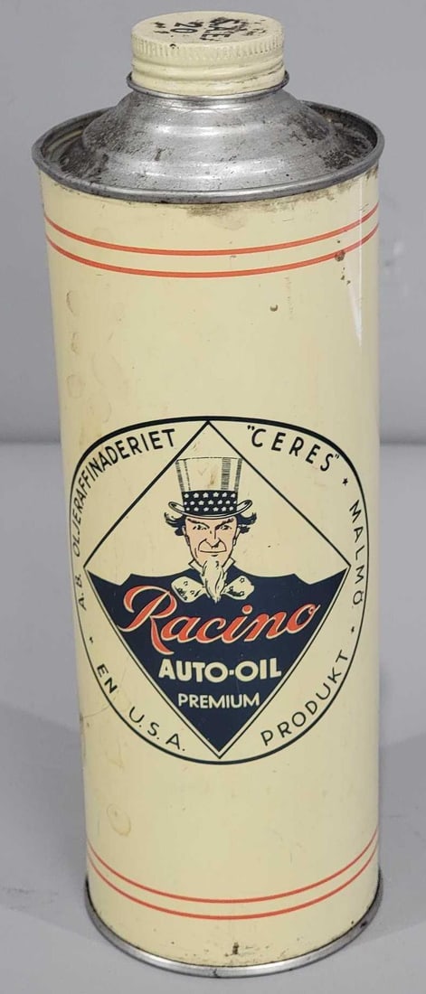 Racino Auto-Oil Premium w/Uncle Sam Logo Round Metal Can: rated 8.25, 9.5"T., the round metal can with screw lid, is slightly soiled, is empty.