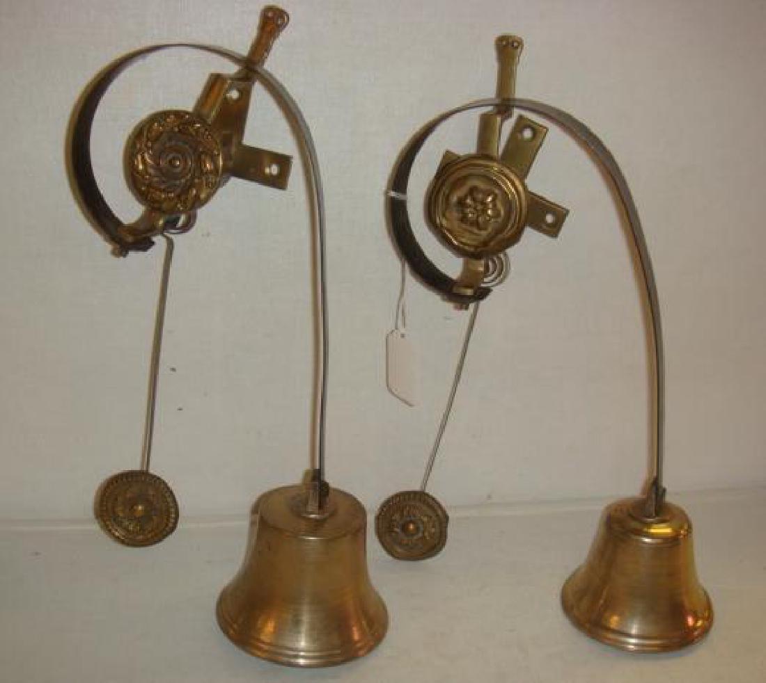 Two Brass Victorian Servants Bells:: Two Brass Victorian Servants Bells: A "Below the Stairs" Piece. Wall Mount Back Plate with Floret Pulley. Cast Iron Spring Arm Supports Brass Bell with Original Clapper. Lower Hanger Alerts Butler to 