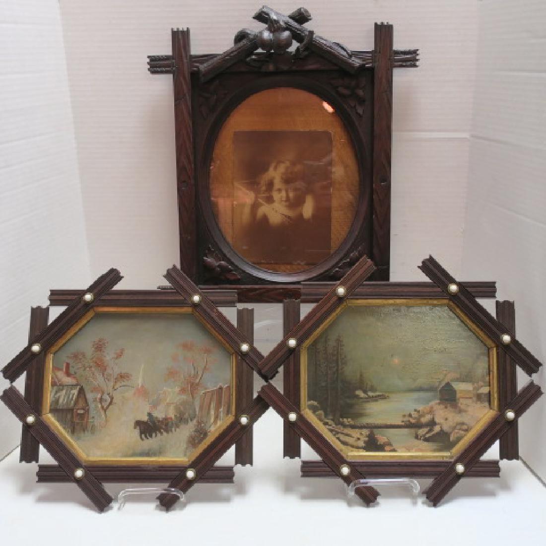 Three Tramp Art Frames with 2 Paintings on Glass:: Three Tramp Art Frames with 2 Paintings on Glass: Landscape Scenes Painted on Outside of Glass. Frames are Line Carved Flatwork Slats Notched Into Grooves and Fastened with Glass Buttons. Gold Liner. 