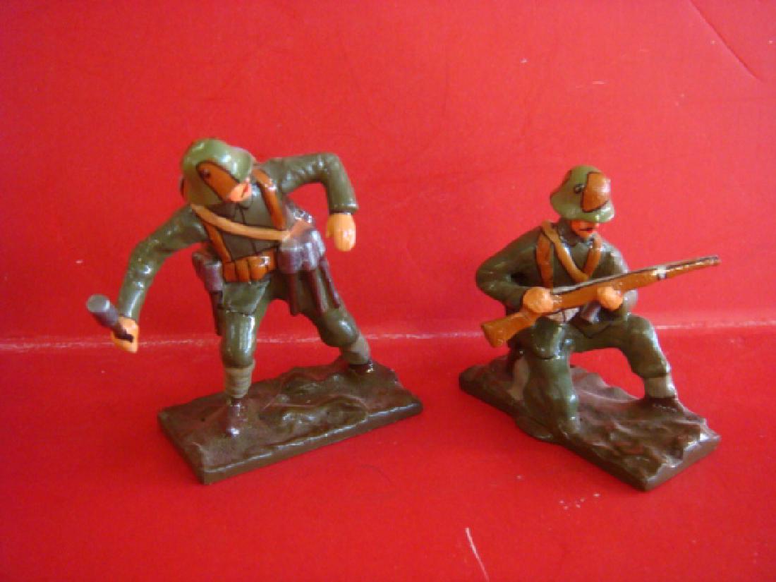 Two Hand painted 54mm Model Soldiers, Storm Troopers:: Two Hand painted 54mm Model Soldiers, Storm Troopers: WWI German Storm Troopers, One Kneeling with Rifle, Grenadier Throwing "Potato Masher" Grenade. Excellent Condition. (100-250)