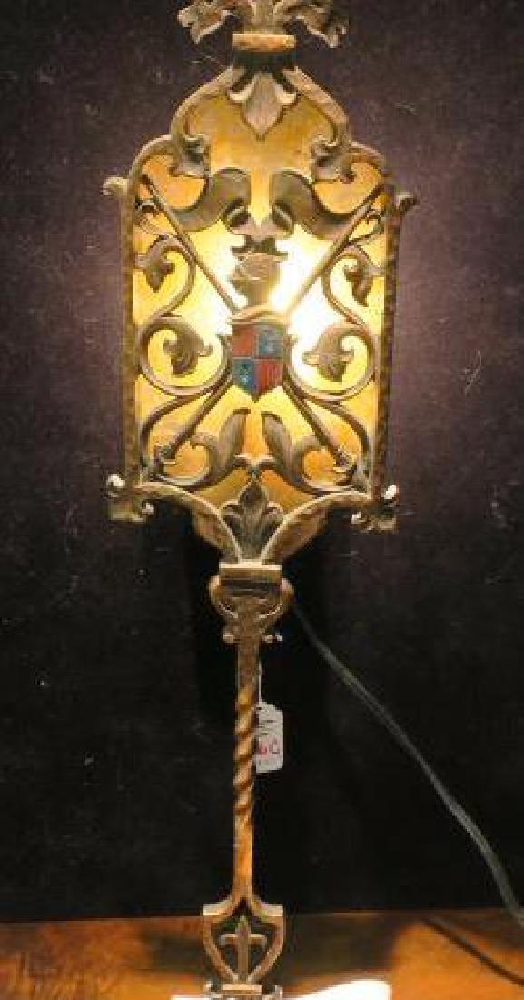 Hammered Wrought Iron Sconce with Shield,: Hammered Wrought Iron Sconce with Shield, Single BulbShield Form Front with Fleur De Lis, Knight, Banner and Shield backed with Amber Mica. Spanish Revival in the Manner of Oscar Bach. Single Candle L