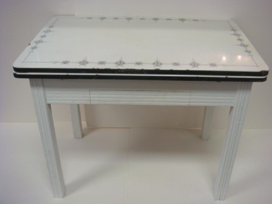 Mid-Century White Enamel Top Table with Extensions:: Mid-Century White Enamel Top Table with Extensions: Kitchen Table with Line Carved Frame on Block Legs with Single Drawer. Black Decoration Around Top Edge. 31"T X 39"W X 25"D with 2 9" Deep Pullout L