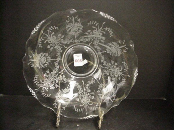 Heisey Iris Etched Center Bowl: 608. Heisey Iris Etched Center Bowl: 12" Diameter with Flared Lip with Swag Garlands Separating Irises. Scalloped Edge with Graduated Balls Spaced Around Lip. Bear in Mind that all items are used. The