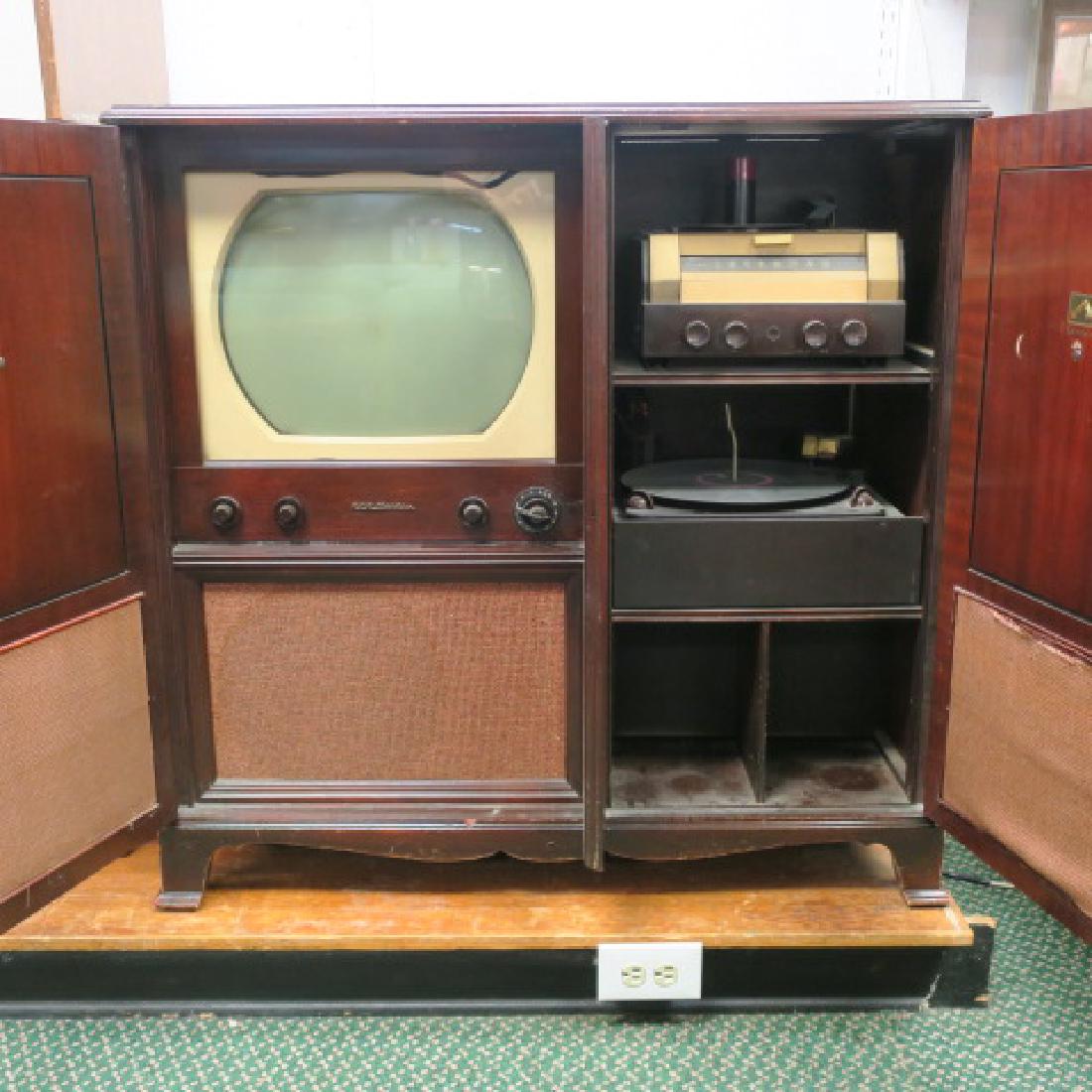 RCA VICTOR Combo TV, Radio, Record Player:: RCA VICTOR Combo TV, Radio, Record Player: Mahogany Case, Ogee Bracket Feet. Matched Veneer Panels. Record Player Plays 33 1/3 and 35 RPMs. 38"T, 38"W, 19"D. (150-300)