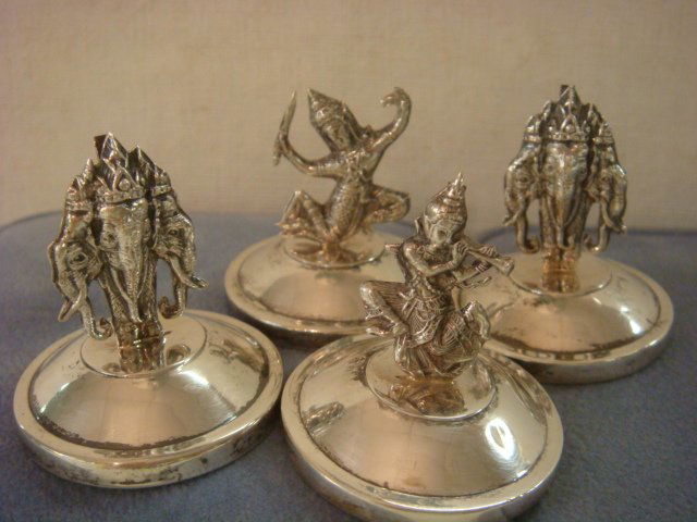Four Vintage Siam Sterling Figural Place Card Holders:: Four Vintage Siam Sterling Figural Place Card Holders: Made by Artisans in Siam/Thailand During the 20th C. Two with Elephants and Two with Goddesses. 6.6 oz. (5.56 Troy oz.). (120-200)