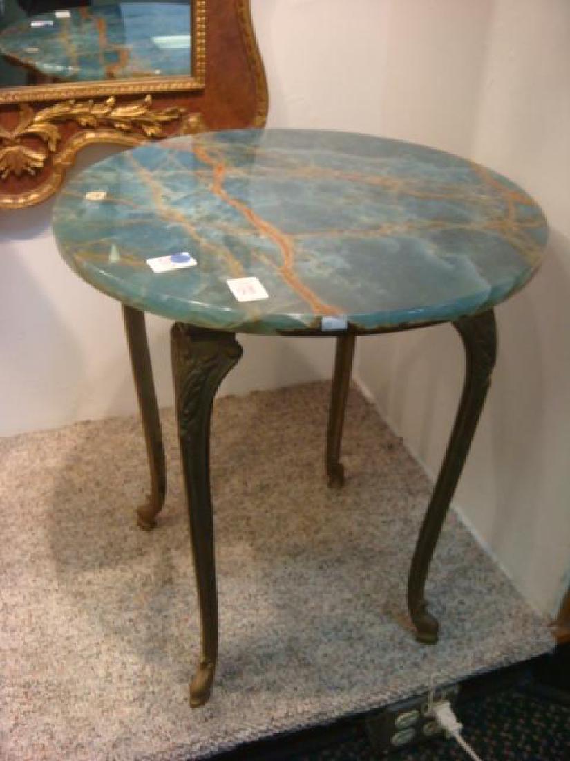 Round Blue Marble Top Table by JIM, Tirrenia Italy:: Round Blue Marble Top Table by JIM, Tirrenia Italy: Solid Slab of Polishes Patterned Sodalite Blue with Tan Veins, 19 1/2" Diameter. Cast Metal Base with Slightly Bowed Legs, Molded Knees and Feet. St