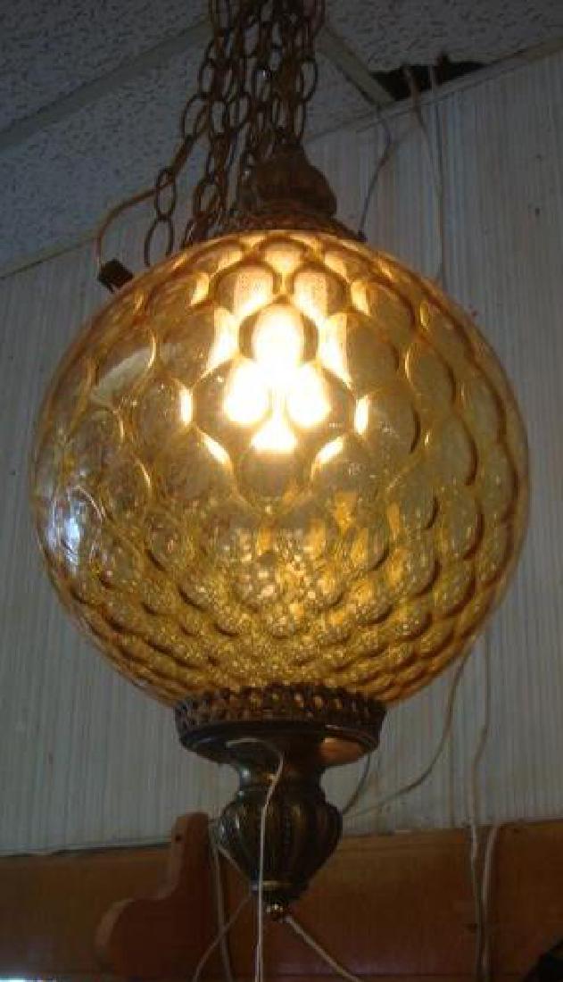 Amber Glass Honeycomb Ball Light Fixture:: Amber Glass Honeycomb Ball Light Fixture: Brassed Metal Top and Bottom. Hangs by Chain from Ceiling. Approx. 20"L. (100-200)