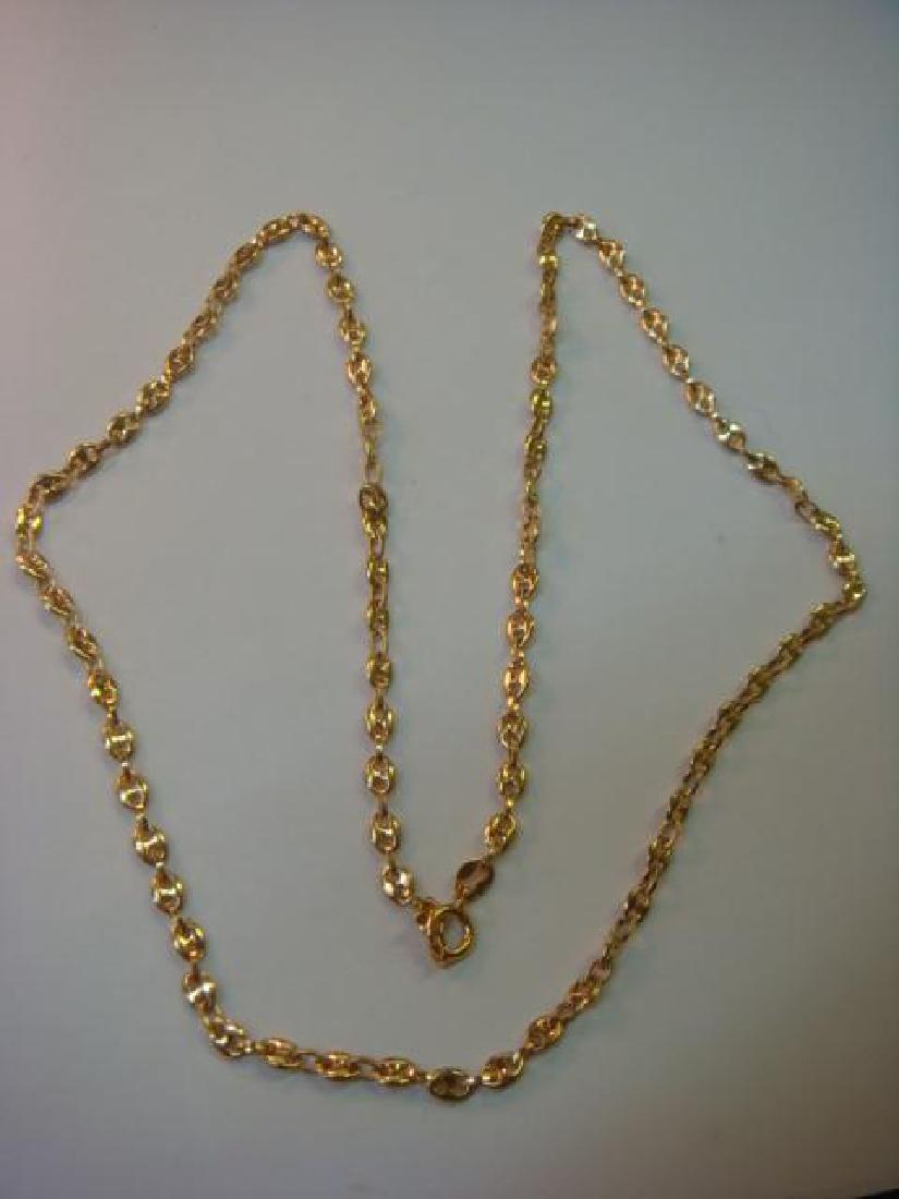 18 KT Gold Anchor Link Chain Necklace 23 1/4" Long:: 18 KT Gold Anchor Link Chain Necklace 23 1/4" Long: Brightly Polished 4.0 mm Solid Link Chain Weighs 11.50 DWT. Marked "750 and 74 AR". Spring Ring Clasp Marked 750. (700-1400)