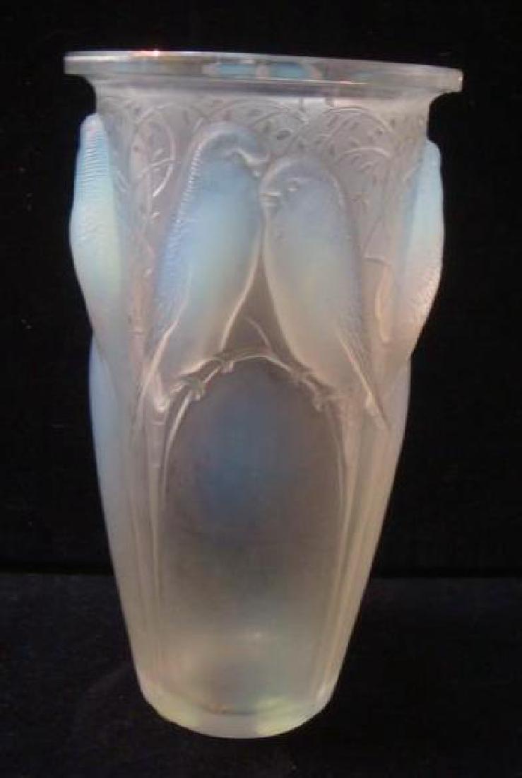 LALIQUE "Ceylan" Opalescent Glass Vase:: LALIQUE "Ceylan" Opalescent Glass Vase: Four Pairs of Relief Opalescent Parakeets with Vines Behind Them. 9 1/2"T. Marked R Lalique France on Polished Bottom. CA. 1920's. (4000-8000)