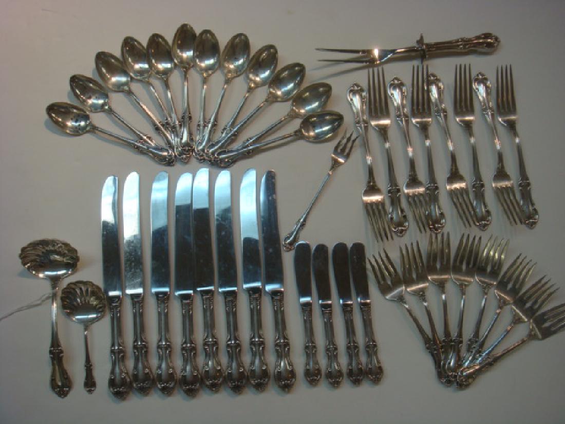INTERNATIONAL Joan of Arc Sterling Flatware, 44 PCS:: INTERNATIONAL Joan of Arc Sterling Flatware, 44 PCS: CA. 1940, Service for 8+. Includes Eight Each Dinner and Salad Forks and Knives, Twelve Teaspoons, Four Butter Spreaders, Shell Bowl Gravy Ladle, P