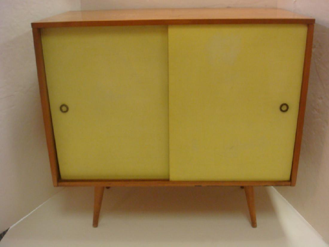 PAUL McCOBB "PLANNER GROUP" Cabinet:: PAUL McCOBB "PLANNER GROUP" Cabinet: Mid-Century Maple with Signature Sliding Grass Cloth Doors & Brassed Hardware. Splayed Danish Tapered Pencil Legs. McCobb (1917-1969) also Designed Radios & TVs fo