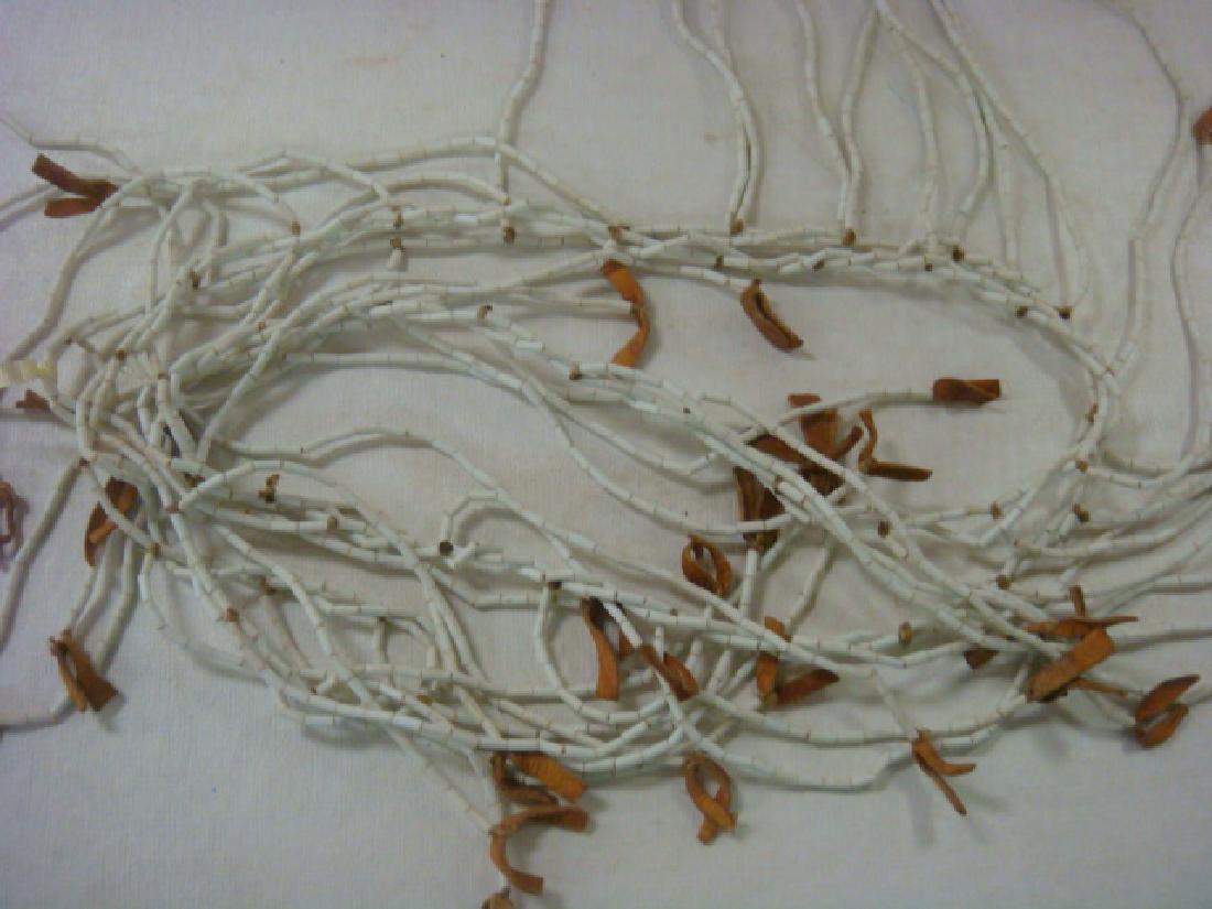 WAMPUM STRANDS, Movie Prop with Certificate:: WAMPUM STRANDS, Movie Prop with Certificate: With Certificate of Authenticity used in the Filming of "The Last of the Mohicans" and "The Broken Chain". Signed by Cleve Landsberg, Producer. Wampum was 