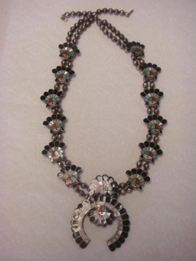 Abalone Turquoise Squash Blossom Necklace:: Abalone Turquoise Squash Blossom Necklace: Sterling Necklace is Handcrafted and Initialed RRK on Back of Pendant. Double Strand of Round Beads with 12 Blossoms and Inverted Crescent Naja. 27"L, Hook a