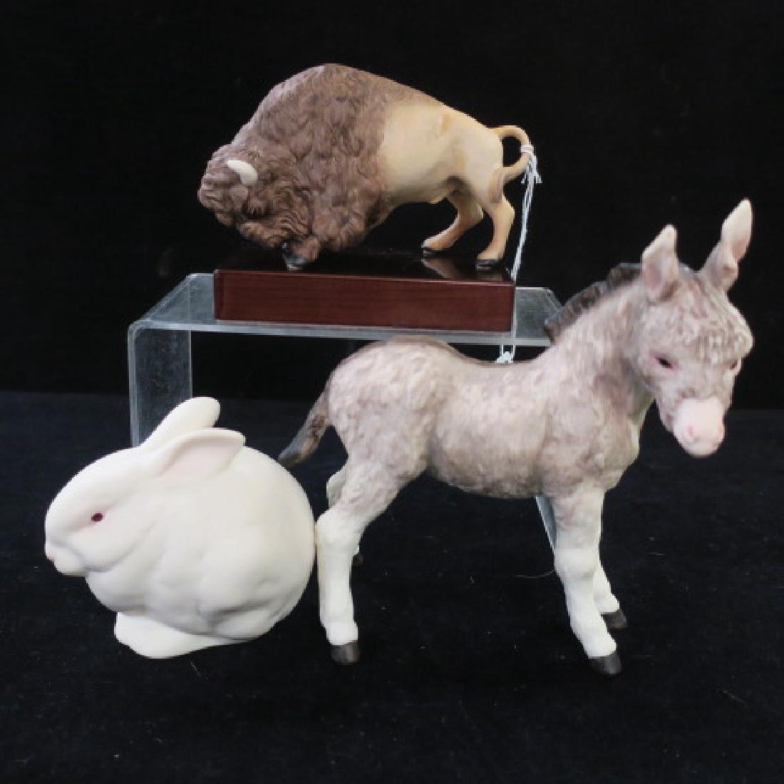 CYBIS Porcelain Donkey, Buffalo and Rabbit:: CYBIS Porcelain Donkey, Buffalo and Rabbit: "Fitzgerald Donkey is 6 1/2"T, 6 1/2"W. Impressed and Signed Mark 1964. 1968 Buffalo or Bison on Wooden Stand is 3"T, 5 1/2"L. "Mr. Snowball" Rabbit is 3 1/