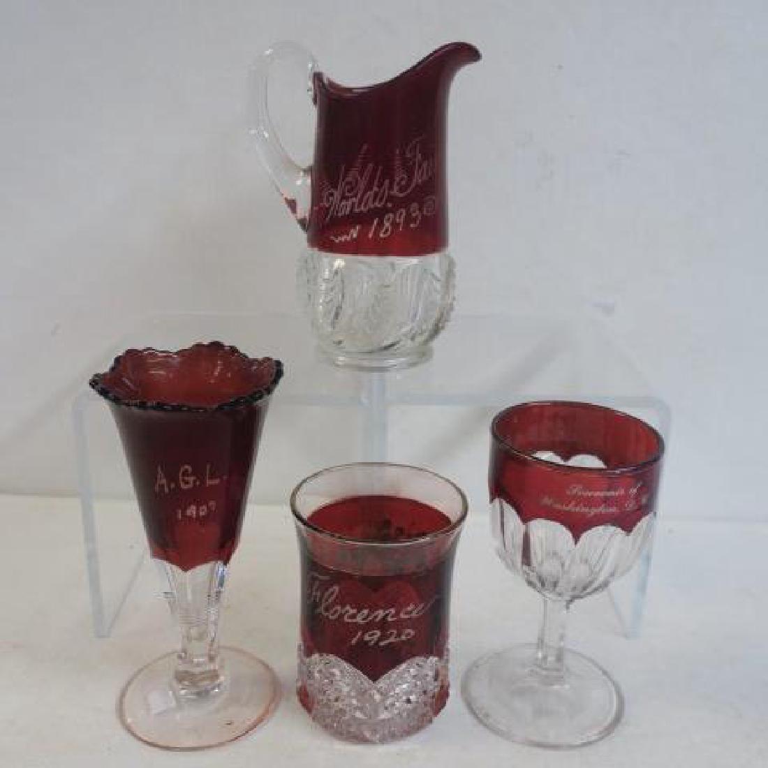Four Pieces of Antique Cranberry Cut To Clear:: Four Pieces of Antique Cranberry Cut To Clear: "Worlds Fair 1893 Tall Syrup Pitcher, Vase "Florence 1920" with Hand painted Roses, "Souvenir of Washington D.C.", Bud Vase "AGL 1907" (80-150)