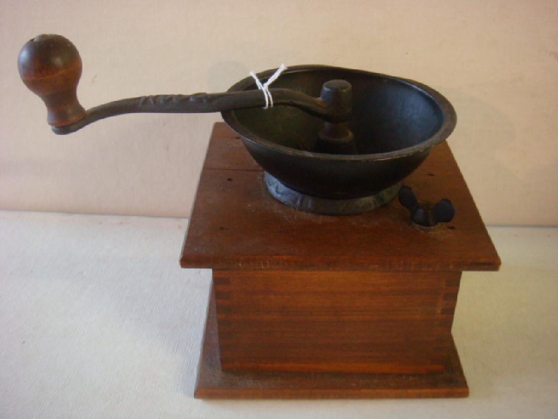 Vintage Wooden & Cast Iron Coffee Grinder:: Vintage Wooden & Cast Iron Coffee Grinder: Cast Iron Top Bowl & Hand Grinder with Wooden Knob, on Wooden Dovetailed Box having Single Drawer. Marked W H Co. on handle. (50-100)