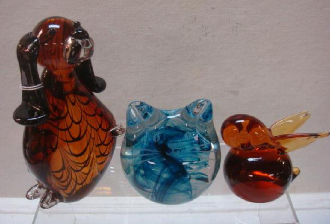 Art Glass Dog, Cat, Bunny and Deer Paperweights:: Art Glass Dog, Cat, Bunny and Deer Paperweights: Amber Glass Dog with Dark Brown Swirls and Ears is 7 1/2"T. Blue Ball Cat with Etched Features is 4 1/4"T. Amber Glass Bunny is 3 1/4"T. Clear Molded D
