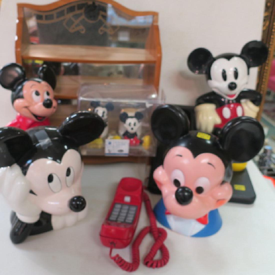 Five Piece WALT DISNEY MICKEY MOUSE LOT:: Five Piece WALT DISNEY MICKEY MOUSE LOT: MICKEY MOUSE Phone, MICKEY MOUSE Salt and Pepper Shakers, MICKEY MOUSE Cookie Jar, Standing MICKEY MOUSE Bank, Bust of MICKEY MOUSE Bank. (80-150)