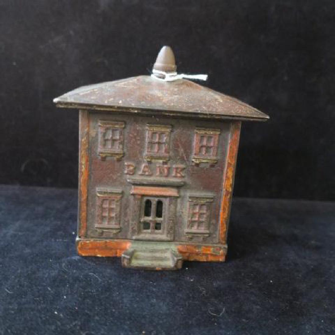 Antique "BANK" Building Cast Iron Bank:: Antique "BANK" Building Cast Iron Bank: Cold Painted Cast Iron 5" x 4 1/4" x 2 1/2" With Lattice Side Windows. (80-150)