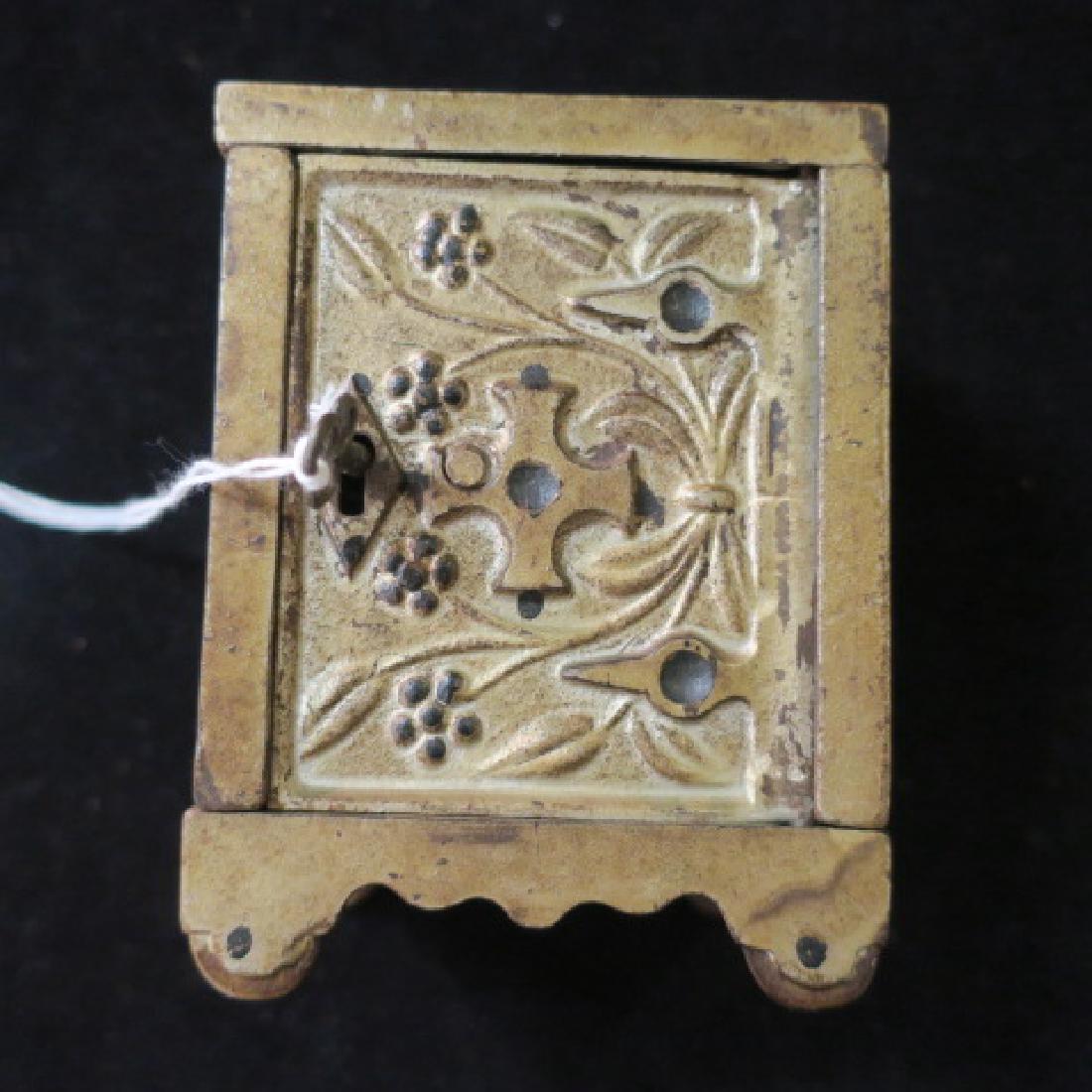 Antique Key Lock Safe No 50, J & E Stevens Co.:: Antique Key Lock Safe No 50, J & E Stevens Co.: With Key, Small Antique Bank in Safe Style. 4 1/8" Tall, 3 1/8" x 2 5/8". The J & E Stevens Co, Cromwell CONN, USA. (80-150)
