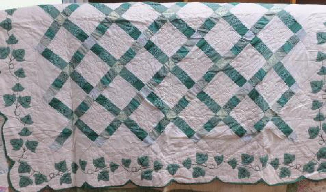 Handstitched Quilt; Green Lattice with Ivy Border:: Handstitched Quilt; Green Lattice with Ivy Border: White Ground with Lattice Work of Green Colored Squares. Border of Ivy Leaves and Vines. Minor Tears. White Reverse. (200-300)