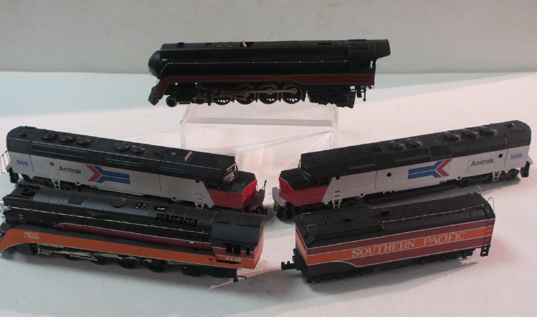 Four HO Scale Train Engines:: Four HO Scale Train Engines: BACHMAN Southern Pacific GS4 4-8-4 with Tender, Norfolk & Western J 4-8-4 No Tender, Two AMTRAK EMD F-9 Diesel Locomotives. (150-300)