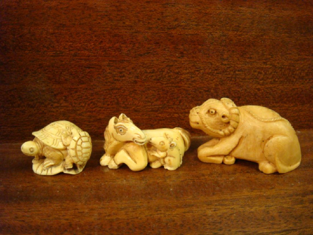 Three Animal Netsukes:: Three Animal Netsukes: Includes Reclining Horned Animal, Reclining Horse with Rat and Two Turtles on Lily Pad. All Signed. These Netsukes are only for Sale in the Commonwealth of Virginia and will NOT