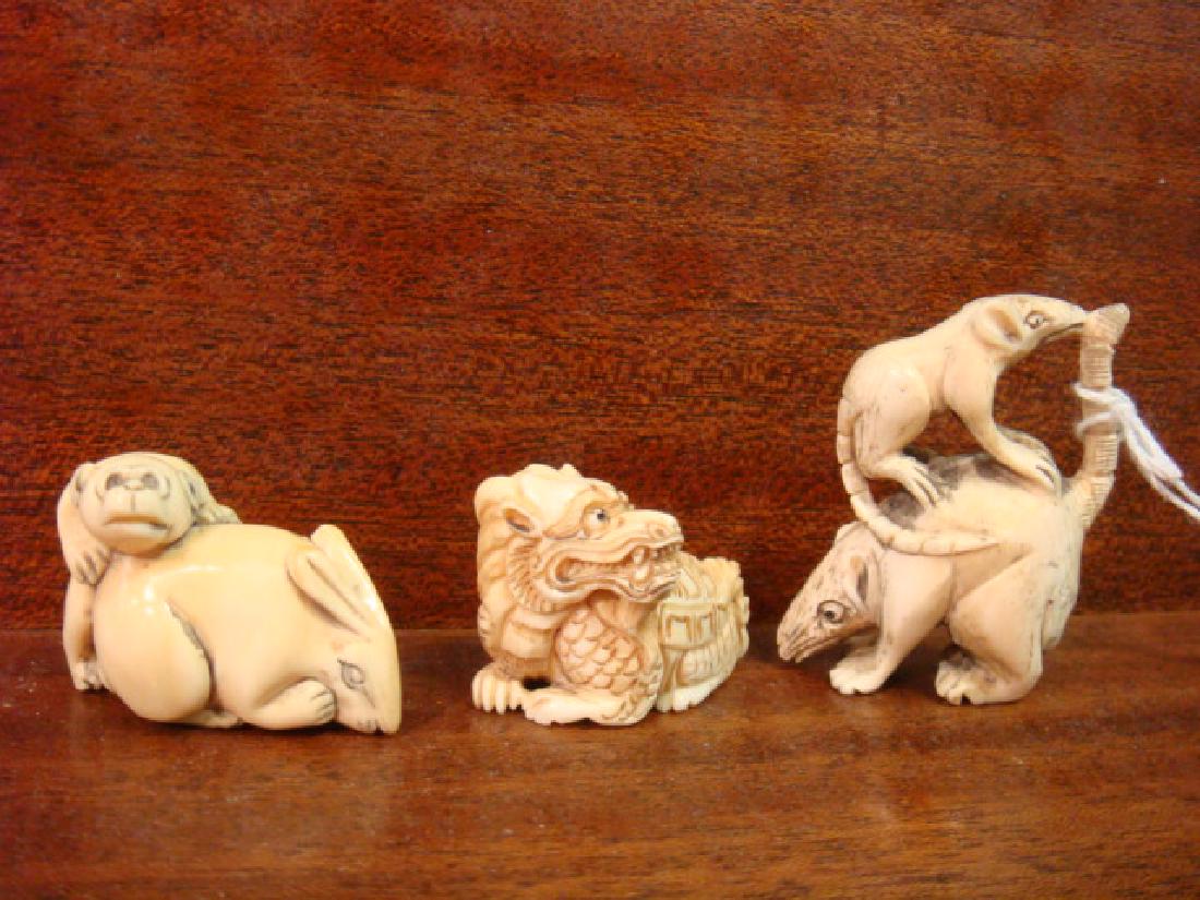 Three Animal Netsukes:: Three Animal Netsukes: Includes Signed Opossums or Rats, Reclining Dragon and Unsigned Rabbit with Loris. These Netsukes are only for Sale in the Commonwealth of Virginia and will NOT be sold Intersta