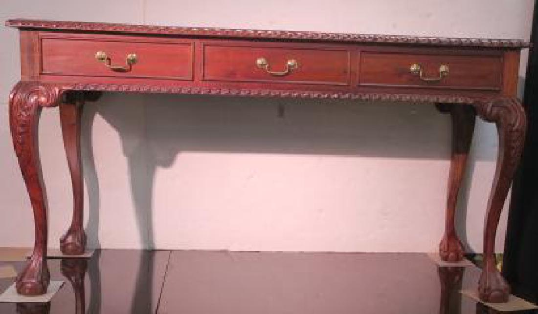 Mahogany Chippendale Style Hall Table:: Mahogany Chippendale Style Hall Table: Rectangular Top with Carved Gadrooning around Edge. 6" Apron with 3 Side by Side Drawers on One side. 3 Faux Drawers on Reverse. Cabriole Legs End in Ball & Claw