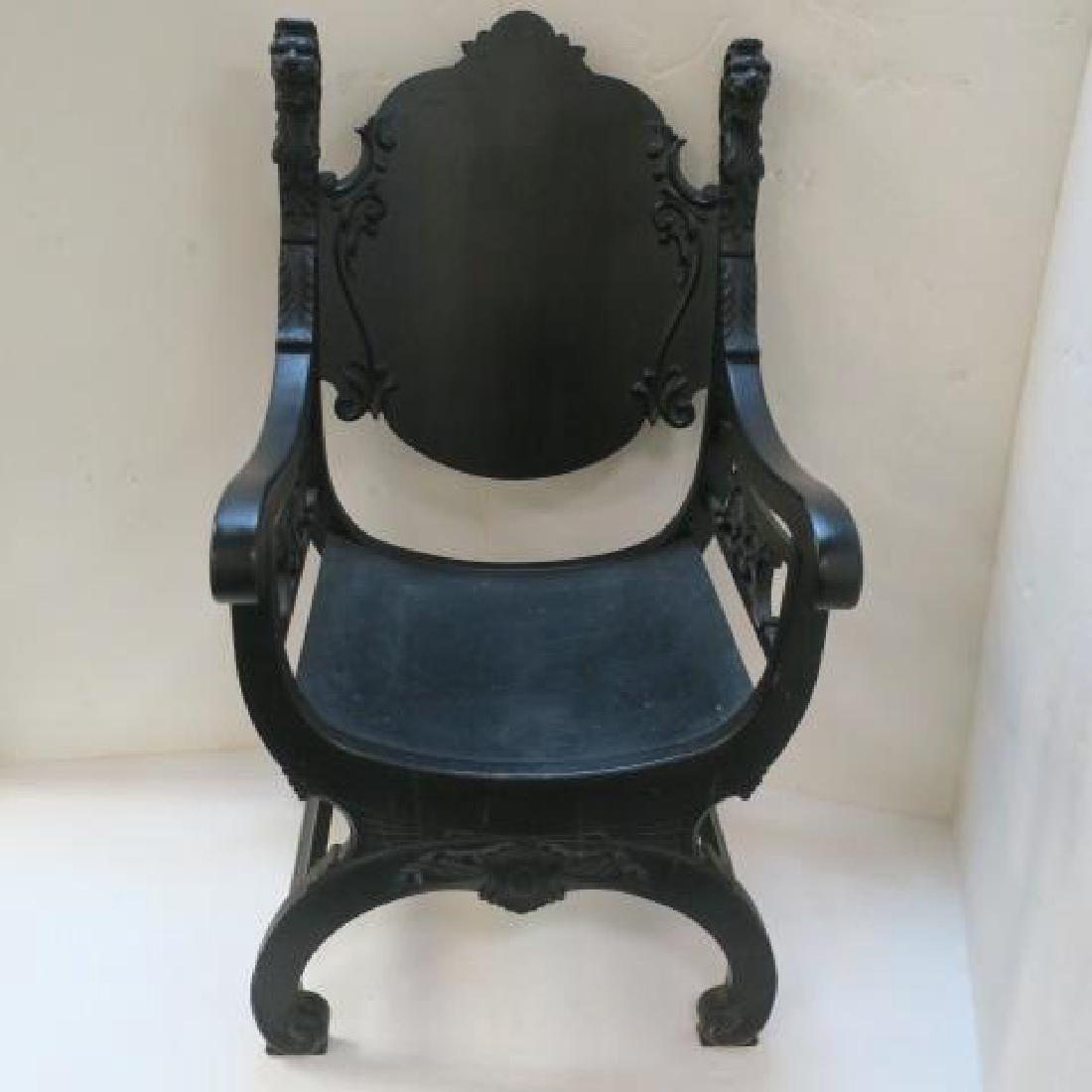 Classical Revival Carved Wooden Throne Chair:: Classical Revival Carved Wooden Throne Chair: In the manner of RJ Horner. Shaped Back panel with Applied Scroll Work and Lions Head Terminals. Down Curved Arms ending in Scrolled Grips with Detailed P