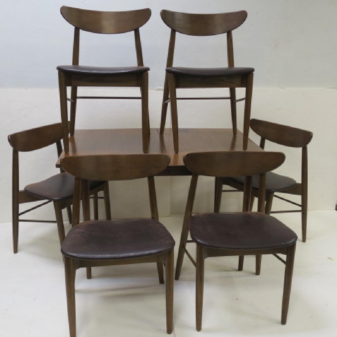 Mid-Century Modern 7 pc. Dining Set by STANLEY:: Mid-Century Modern 7 pc. Dining Set by STANLEY: Inspired by the work of Danish Designer Peter Hvidt. Angle Shaped Table with 6 Leather Like Upholstered Chairs, Wide Seats and Bowed Back for Comfort. E